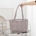 Quilted floral tote bag with bow embroidery and large capacity held in minimalist room - Red Floral