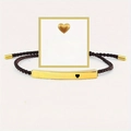 Close-up of woven bracelet with gold-tone metal plate featuring Just Breathe engraving - Just Breathe Gold Bar Coffee Rope With Card