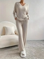 Cream knit loungewear set featuring V-neck long sleeve top and wide-leg ribbed trousers - S / Apricot
