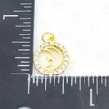 Gold round pendant with crescent moon and star patterns and inlaid zircons - Moon & Star