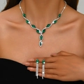 Elegant silver necklace set with marquise emerald stones and long diamond tassels - Necklace and Earring Set / Emerald Green