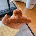 Ginger plush hair claw clip for women shown in hand with warm winter knit sweater - Caramel Plush Hair Claw