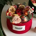 Red velvet Christmas gift box featuring preserved roses, cinnamon sticks, and LED string lights - Christmas Velvet Gift Box [Red]