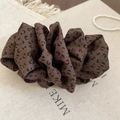 Detailed close-up of brown leopard print hair scrunchie with soft fabric texture - Brown Black Leopard Twisted Clip