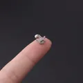Silver stainless steel butterfly cartilage stud with sparkling cubic zirconia on fingertip - Silver Flower Cluster Style (354-11#S)