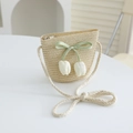 Detail of straw woven crossbody bag featuring light green ribbon and tulip pendants - 52cm (2-5 Years) / Bag / Beige