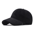 Fuzzy faux fur baseball cap in solid black with thick plush texture for winter warmth - Black