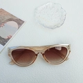 Y2K cat-eye sunglasses with transparent champagne frames and gradient brown lenses - Champagne