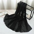Detailed view of black chiffon scarf fabric texture and clean stitched edges - 175cmx70cm / Black