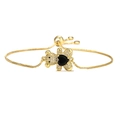 Dettaglio del bracciale con orsetto dorato, zirconi bianchi e pietra a cuore nero - Oro + Orso Cuore Nero