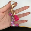 Pink resin letter L keychain with pink tassel and glitter ball in golden finish - Small Ball Tassel Clasp / L
