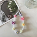 Detail of beaded phone strap with pink tulips and colorful acrylic flower charms - Flower Butterfly A2