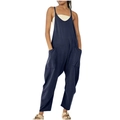 Detail view of dark blue baggy jumpsuit with side pockets and thin spaghetti straps - Navy Blue