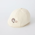 Detail of baby otter embroidery and Lutra text on cream white cotton beret cap - 48cm (5-18 Months) / Off-white