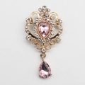 Vintage golden brooch with pear-shaped pink crystals and sparkling round rhinestones - Light Pink