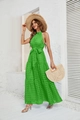 Detail of green halter maxi dress featuring layered ruffles and textured grid pattern - Green