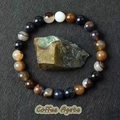 Natural coffee agate stretch bracelet featuring unique silk textures and round beads - Coffee Agate