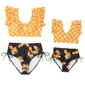 Matching yellow polka dot ruffle tops and lemon print bikini bottoms for family sets - Orange