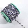 Detailed spool of stainless steel chain with blue and yellow enamel daisy flower charms - Steel + Dark Blue