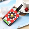 Colorful floral pattern PVC luggage tag with adjustable black strap on white book - Large Floral