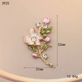 Macro detail of enamel flower brooch with pink buds, green leaves, and 31x52mm dimensions - Rhinestone Flower Cluster (3925)