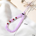 Beaded pearl phone strap in lavender purple with flower charm, 19cm length and 11g weight - Purple Jade Color Beaded Flower Phone Chain (K3488)