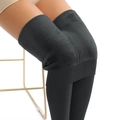 Primer plano del forro polar grueso y tejido elástico denso de los leggings de invierno - Talla única / Negro