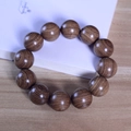 Single strand green sandalwood mala bracelet with twelve natural wood grain beads - 10mm / Gold Silk Sandalwood