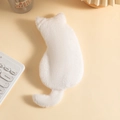 Close-up of soft white plush cat pencil case with fluffy faux fur texture on a warm desk - White
