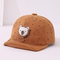 Close-up of brown cotton baby cap with bear embroidery and soft peak detail - 48cm (6M-2Y) / Caramel color