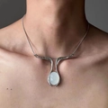 Punk silver wrap necklace with a streamlined white oval gemstone pendant on a model - Geometric Water Drop Necklace