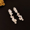 Macro di orecchini d'argento a forma di lava liquida irregolare con finitura lucida - Orecchini Pendenti Irregolari (Perno in Argento) / Argento