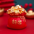 Miniature red lucky money bag resin statue with gold ingots for wealth and good fortune - Good Luck Bag Red