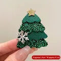 Christmas tree brooch in green felt with gold star and sequins measuring 5.4cm by 4.1cm - Cake Green Xmas Tree