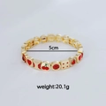 Bracelet élastique plaqué or avec breloques cœur, cerise et dés en émail rouge, poids 20,1g - Cœur Cerise Rouge