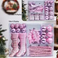 Set decorazioni natalizie rosa e viola con alberi, calze e palline in scatola - Rosa