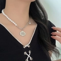 Chic pearl and silver metal chain necklace with cloud pendant on female model - Spliced Cloud Pendant Necklace (X1222) / Silver