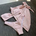 Three-piece light pink bandeau bikini set with textured dot fabric and matching sarong - Light Pink