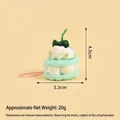 Mini Blauer Macaron Anhänger mit grüner Kirsche Deko und 4,5 cm Höhe für Schlüsselbund - Cupcake / Türkisgrün