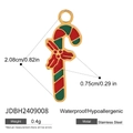 Detailed view of enamel candy cane charm with bow and dimensions 2.08cm x 0.75cm - Candy Cane