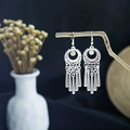 Ethnic bohemian silver hollow disk earrings with green beads and metal tassels - Hollow Disc Green Bead Tassel Style (E5584)