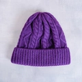 Close-up of purple cable-knit pattern and ribbed cuff on a soft winter beanie hat - M (56-58cm) / Purple