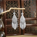 Bohemian silver peacock feather tassel earrings with ethnic hollow leaf design - Silver Multi-Layer Feather Tassel(E5682-1)