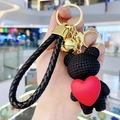 Creative black woven resin bear keychain with red heart and gold bell pendant - Black