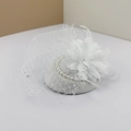 Macro detail of white bridal fascinator featuring lace mesh, feathers and pearl accents - One Size / White