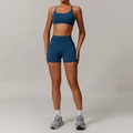 Women's dark blue seamless ribbed yoga set featuring racerback bra and high waist shorts - S / Bra + Shorts / Navy Blue