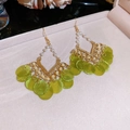 Detailed close-up of shell pearl tassel earrings with green pendants in a jewelry box - Green Fan Shape Pearl Drop (Ear Hook)