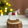 Cheval à bascule de Noël blanc en résine avec selle rouge et base dorée, haut 7,5cm - Blanc