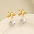 Elegant gold starfish and silver heart drop earrings on a white textured display tray - Starfish Heart Patchwork Style (CK67) / Gold and Silver