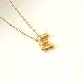 3D balloon style letter E pendant necklace in shiny gold finish on a fine bead chain - Letter E(S-P062-E)